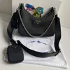 Borsa da donna Designer di lusso Borse in nylon con lettere Borsa a tracolla hobo in tela all'ingrosso signora Tote catene borse borse messenger prad 3 Pie 1