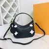 Designer Luxury Bagatelle BB M46091 Axel Mini Hobo Bag Tote präglad på läderstorleken: 25*18 cm