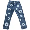 Jeans para hombres Lágrimas de mezclilla europeas y americanas Otoño Invierno Vintage Estampado de flores Lavado Suelto Jeansumga recto