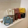 Wholesale Shop Online handbag small square bag embossed big rivet solid color Single Shoulder Bag