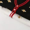 Swetry damskie Wysoki sweter Kobiety Jakość Projektant mody Sweter z haftem pszczół Koreański kontrast Długi rękaw Jednorzędowy dzianinowy top