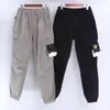 Enfärgade byxor konng gonng Multi big Pocket overall byxor Vår och sommar nytt modemärke retro herr jogging Leggings herr