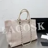 2024 Bolsos de diseñador Bolsos de mujer Bolso de hombro de playa de verano Bolso de compras de lona Tote de moda para mujer con estuche de calidad increíble