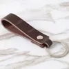 LLavero de cuero genuino Retro de alta calidad para hombres y mujeres, regalo para amantes, llavero con anilla para llaves