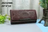 Luxuly Designer Mens Womens Leather Clutch Wallet Card Holders Bags Ladies Button Embans M Pönster HASP Credit Cards Coin Purse6582803