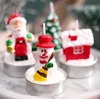 شمعة خالية من العطور 12pcs/Pack Santa Santa Snowman هدية تخزين شجرة تصميم شمعة XMAS الزخار