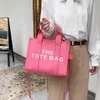 2022 LE TOTE BAG FEMMES FORME LADE Large Cross Body Men New Style Designer Practical Capital Square Sac à main Crossbody Portefeuille Coin Sunse Famous Casual