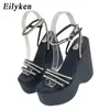 Nxy Sandals New Narrow Band Punk Wedges for Women Gladiator Buckle Strap Sexy Platform Crystal Diamond Nightclub Party Shoes