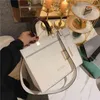 Venta directa de fábrica Wang Hong Lin Mismo bolso de mano Carta Un hombro Mano Mujer Gran capacidad Otoño e invierno Diseñador de moda