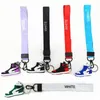 2PCS/SETS Designer Silikon 3D Sneaker Białe klęskość pokolenia Mężczyźni Kobiety Key Key Ring Buty mody Bogarki Bag Łańczka samochodowa Basketball Butball Biekurz 8 kolorów