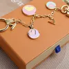 Chain Style Keychain Luxury Designer Round Pendant Gold Key Buckle Classic Letter Shape High Quality Stylish Keychains Bag Keys Ornaments