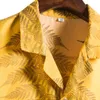 Tracksuits voor heren sjaal Tuxedo Men Spring zomer 2 -delige sets strand bedrukte shirt shirt met korte mouwen set revers blouse mode heren klassieke pakmannen '