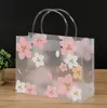 Sac étanche résistant à l'usure de fleur de cerisier Portable sacs-cadeaux transparents givrés sac à main sac à provisions emballage de vêtements