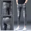 Корейский 2022 модные джинсы мужские весенние и летние каприры серая дыра эластичная слабая леггинсы тонкий стиль