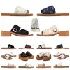 Women's Lace Designer Woody Flat Mule Sandals Luxurys Famous Slippers for Women Rubber Plateaus Sandalen Zwart Wit Beige Mode Luxry Sliders Dames Plats Slides