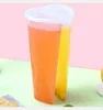 Bicchieri monouso in plastica trasparente a forma di cuore da 600 ml con coperchi per tè al latte e succhi di frutta per coppia di amanti F0415