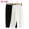 Pantalons de taille plus femme dames été recadrées pour les femmes grandes pantalons blancs élastiques noirs 2xl 3xl 4xl 5xlwomen's