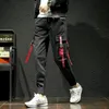Calça masculina moda de bolso masculino masculino de hiphop cor de hiphop risques de tamanho das calças cinturão feminino de rua de rua