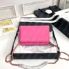 Bolsos de diseñador bolsos de hombro de lujo Flap woc woc mini manual caviar de cuero clásico cuerpo cruzado envolvente envolvente billetera de bolsas de niña portátil en cadena