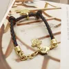 أقراط مصممة الأزياء ضد خطاب Banshee Medusa Head 18K Gold Plated Womens VE1