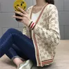 Maglia da donna T-shirt Cardigan Maglione Tessuto Cappotto di lusso Donna Scollo a V e abbottonatura Manica lunga In vendita Inverno Oversize Airy Rib-knitWo