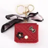 Porte-monnaie en cuir porte-clés porte-clés foulard en soie porte-écouteurs porte-clés de voiture PU mini portefeuille fleur sac breloques pendentif bijoux accessoires pour femme cadeau