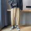 Calça masculina de rua coreana masculina largura cor de cor de algodão sólido Homem de tamanho grande
