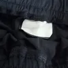 21SS Mode Lässige Herrenhose Trendige und vielseitige schwarze Jogginghose mit Buchstabenstreifen Loose Drop Straight Hose2297