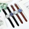 Venta caliente Reloj Hombres Regalo Reloj de cuarzo Moda Cinturón de cristal azul Relojes para hombre Estilo casual de negocios