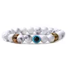 Evil Eye Natursten Pärlsträngar Armband Designer Smycken Guld Krona Vit Turkos Tiger Eyes Hematit För Män Kvinnor Älskare Elastiskt rep Armband 12 färger