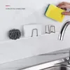 Sink Rack Punho livre Esponja Aço Inoxidável Auto-adesivo Drenagem Seco Pano De Armazenamento Cozinha Gancho De Parede Acessórios De Armazenamento Acessórios