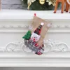 Stock Christmas Cartoon Cholping Santa Claus Snowman Elk Rismes Nop Candy Gift Socks Bag Festivat