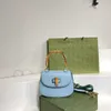 Klasyczna mini -torba luksusowa designer z bambusa Uchwyt Wysokiej jakości skórzany Wykwintny torebka zamka