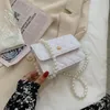 Sacs à bandoulière en cuir PU pour femmes, Mini ceinture de perles, sacs à main de luxe, rouge à lèvres de voyage, 2023