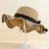 Wide Brim Hats Lady Bowknot Straw Hat Summer Foldable Beach Cap Seaside Anti UV Sun Visor Simple Edge Sunshade Vacation AccessoryWide WideWi