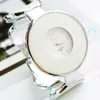 Avanadores de pulso Moda Feminina Flor Analog Pattern Big Dial Dial Silver Band Pulseira Assista Pétalas em forma de coração Pétalas de pulsoWatchesWris