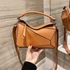 Amazing Luxurys Projektanci Geometria Torby na ramię Torba na poduszkę Crossbody Clutch Skórzane torebki Messenger Kobiety Tote Torebka Portfel Geometric 5A Stock