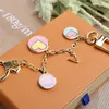 Chain Style Keychain Luxury Designer Round Pendant Gold Key Buckle Classic Letter Shape High Quality Stylish Keychains Bag Ornaments