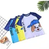 3-teiliges Set für Kinder, Jungen, Badebekleidung, Cartoon-Hunde-Aufdruck, Badeanzug, kurzärmeliges T-Shirt mit O-Ausschnitt, Oberteile und Badekappe, Mütze und Shorts, drei kindlich