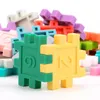 Jigsaw Puzzle Piece Massaggiagengive in silicone Giocattoli educativi impilabili per bambini Morbidi blocchi di blocchi in silicone per bambini Set regalo per bambini di 16