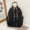 Ny varumärke 23SS ryggsäck för kvinnlig man handväska svart blommor läder resväska stor kapacitetskedja crossboby tillgängliga kvinnors handväskor plånbok lyxmens bagage