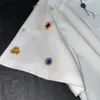 Damska koszulka dla kobiet luźne designerskie topy załoga bawełniana T-shirt z literami koraliki Dziewczyny Krótka marka Milan Runway High End Top Top Pullover Thirt Paav Paav