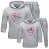 Tute da uomo Fashion Couple Uomo Donna Felpe con cappuccio 2PCS Set Felpe con cappuccio da jogging Pantaloni sportivi High Street Desigh Uomo SuitMen's