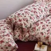 Set di biancheria da letto di classe A in cotone super morbido lavorato a maglia nudo per dormire in quattro pezzi retrò rosa francese piccolo floreale Tianzhu 1.8 biancheria da letto Biancheria da letto