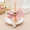 Keychains Elegant Ribbon Bow-Knot Crystal Ball Crown Keychain For Women Girl Cute Pompom Fur Key Chain Bag Charms Keyring Party Gift Enek22