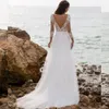 Vestidos de noiva sexy A-line Mangas compridas v pescoço oco oco lace aplique lantejas de lantejoulas de piso comprimento de piso de tule renda oca de tule plus size vestidos de casamento boho plus size size