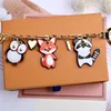 Mode Cartoon Sleutelhanger Tas Auto Hanger Metalen Haak Met Geschenkdoos Geschikt Voor Mannen Dames Kinderen Designer Keychain308B