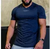T-shirt da uomo Colore puro Palestra Uomo Maglia poliestere Slim Manica corta Sport Bodybuilding Fitness T-shirt da allenamento per uomo Top