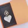 Cadena de llaves de la marca de diseñador hombres de llave de lujo con llaves de coches en forma de corazón