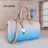 Diseñador clásico de moda 33 CM Gran capacidad de uso general Tote Bolsas de viaje Mujer Hombre Cuero Lona Llevar Equipaje Correas de hombro Bolsa de lona Messenger 40391